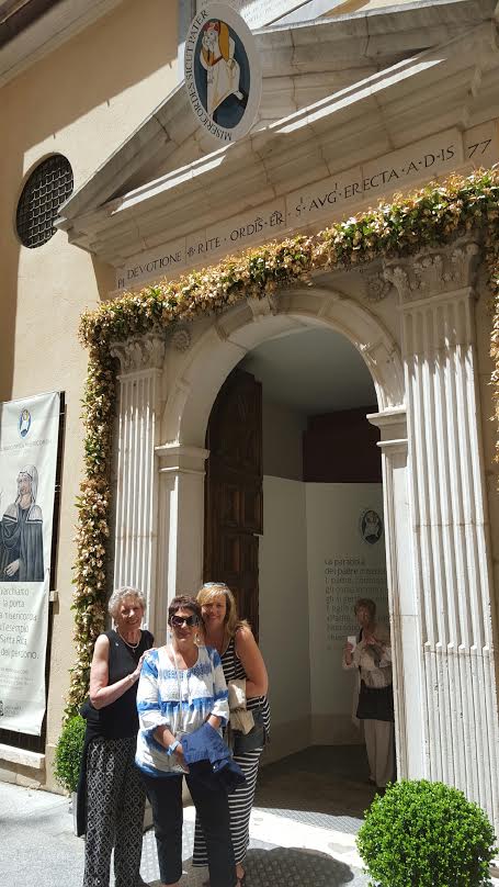 walking-through-the-holy-doors-of-st-rita-s-church